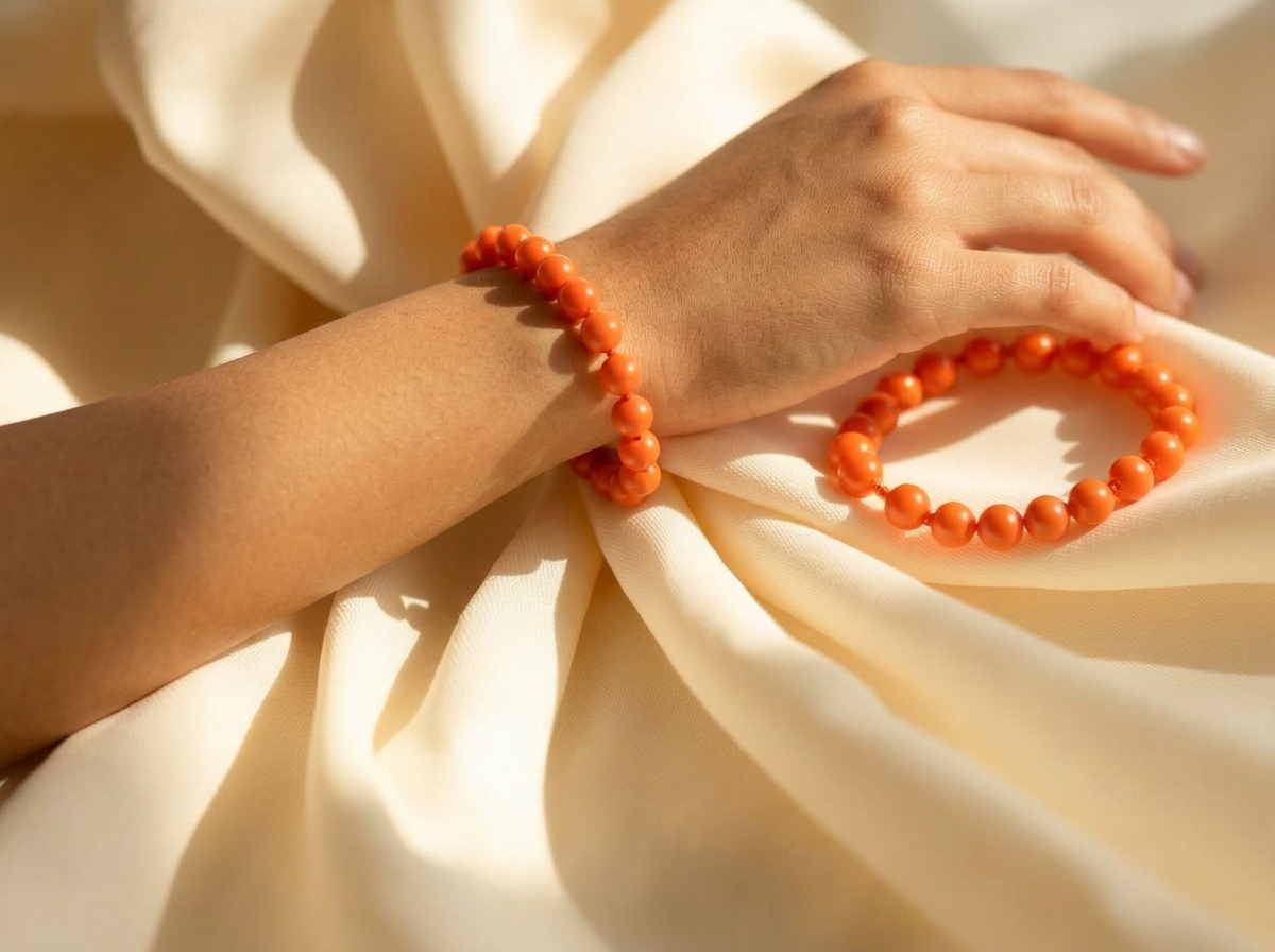 Cream draped fabric with coral beads